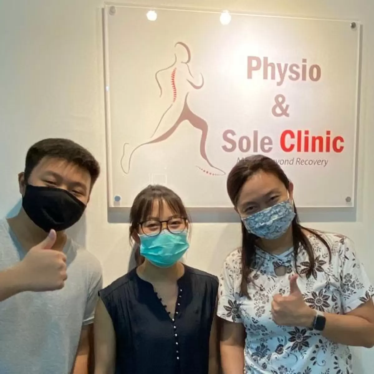 Angela Ong & Thai Low with their clinician at Physio & Sole Clinic