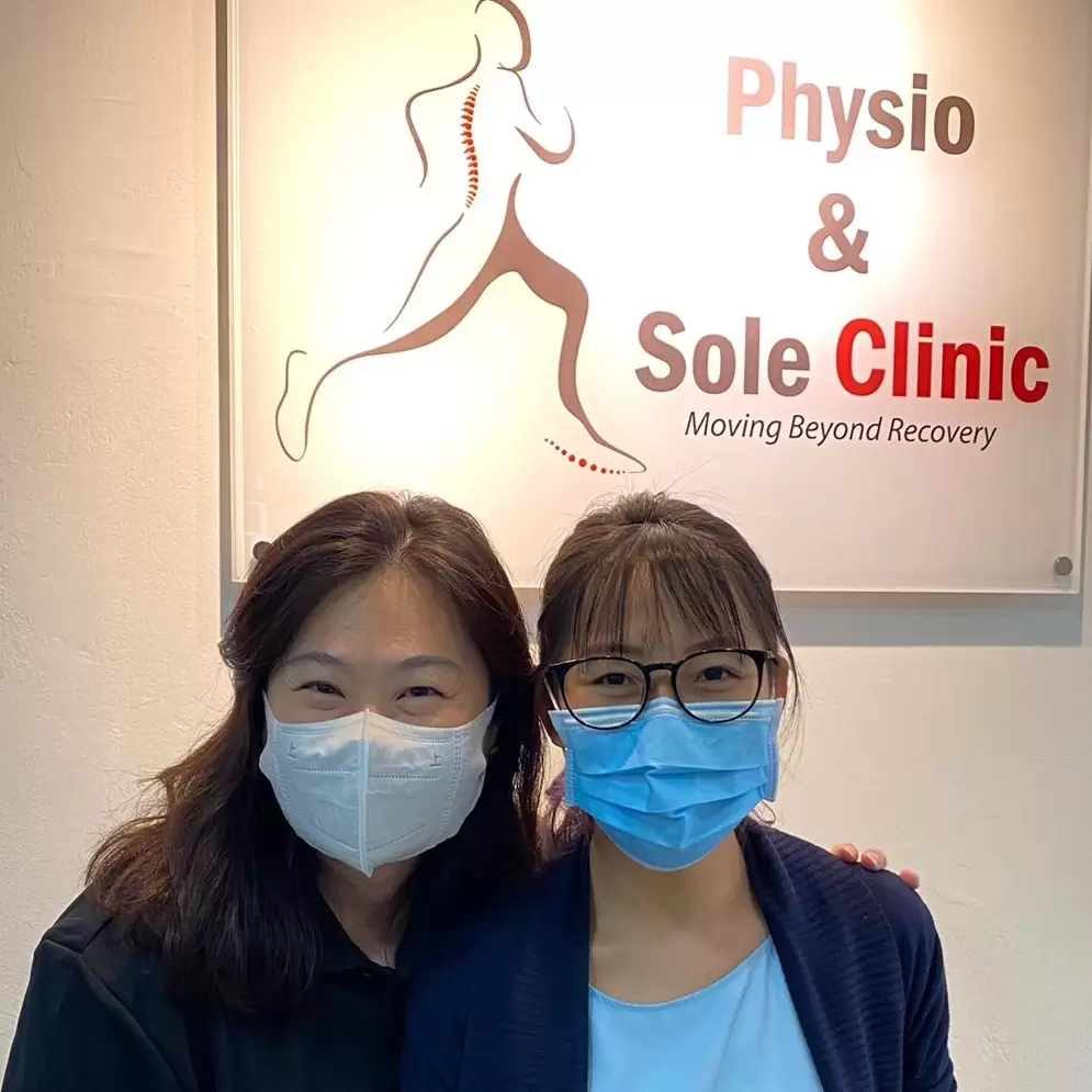 Low Wei Kiin with their clinician at Physio & Sole Clinic